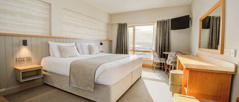 Premium bedding, desk, blackout curtains, iron/ironing board