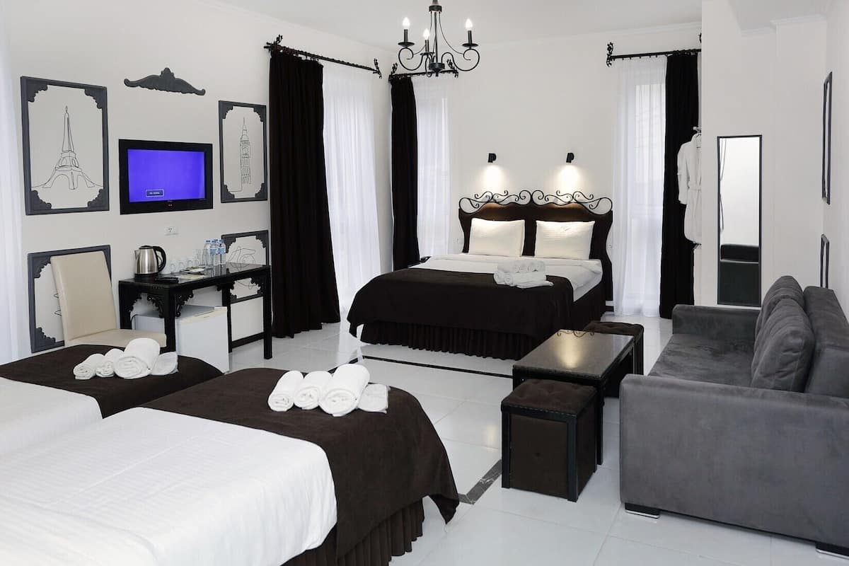 Quadruple Room | Premium bedding, in-room safe, desk, free WiFi