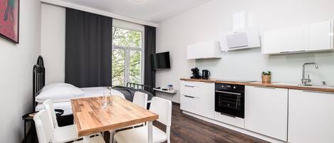 Apartment | Living room | 42-inch flat-screen TV with cable channels, TV