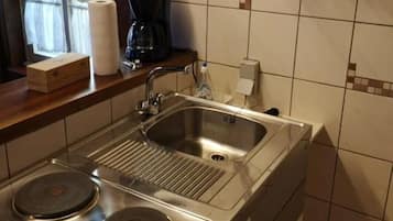 Frigorífic, forn, placa de cuina i cafetera i tetera
