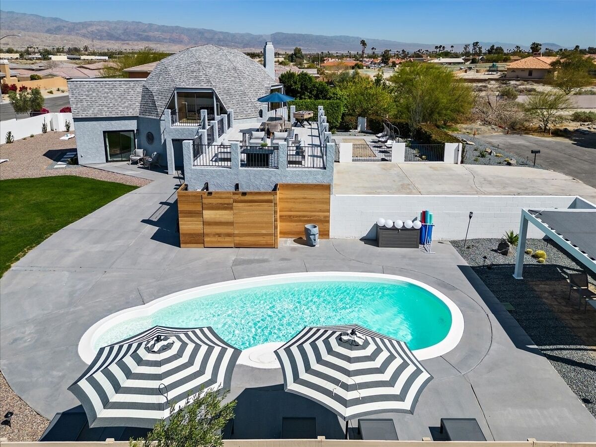 Your desert Oasis awaits! Conquer the Valley in full luxury with all the amenities this home has to offer... lounge by the pool, soak in the hot tub, play a few rounds of bocce ball.