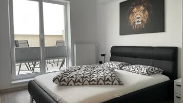 3 chambres, coffres-forts dans les chambres, fer et planche à repasser