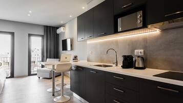 Deluxe Apartment, 1 Queen Bed with Sofa bed, Balcony | Private kitchen | Fridge, microwave, espresso maker, coffee/tea maker