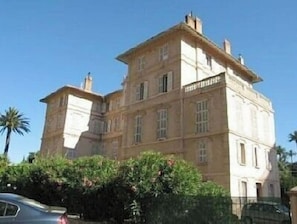 A large, historic building with multiple stories and a classic architectural style.