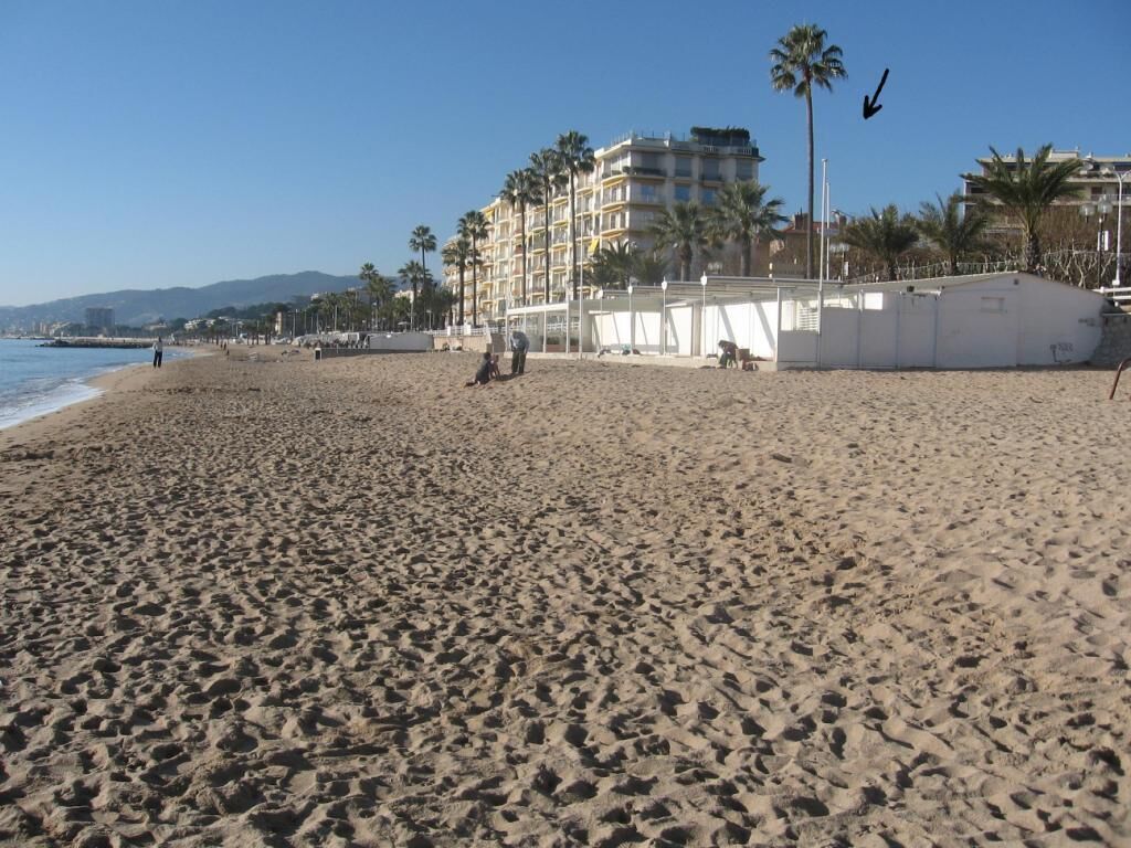On the beach, sun-loungers