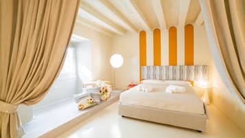 2 habitaciones, caja de seguridad en la habitación y escritorio