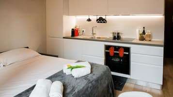 1 habitación, tabla de planchar con plancha, wifi y ropa de cama