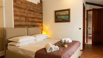 2 habitaciones, tabla de planchar con plancha, wifi y ropa de cama