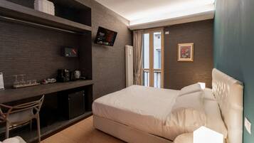 1 slaapkamer, een strijkplank/strijkijzer, wifi, beddengoed
