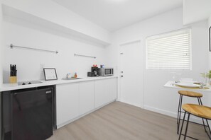 Standard Condo | Private kitchen | Mini-fridge, microwave, stovetop, coffee/tea maker