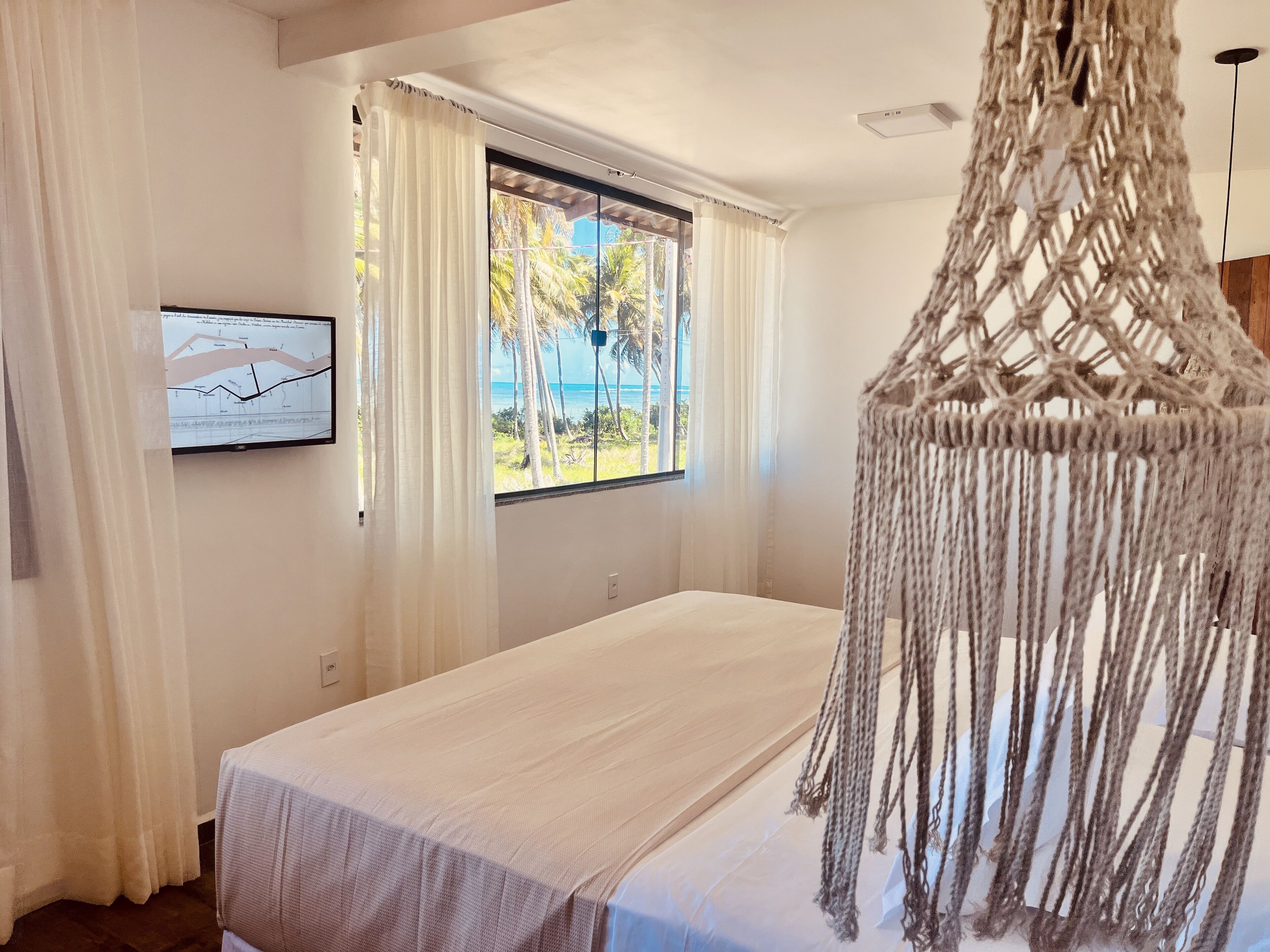 Suite com Vista Mar | Pillowtop beds, free WiFi, bed sheets