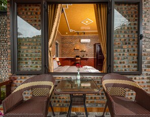 Bungalow Deluxe, 1 cama King size, para fumadores, en el área del jardín | Vista desde la habitación