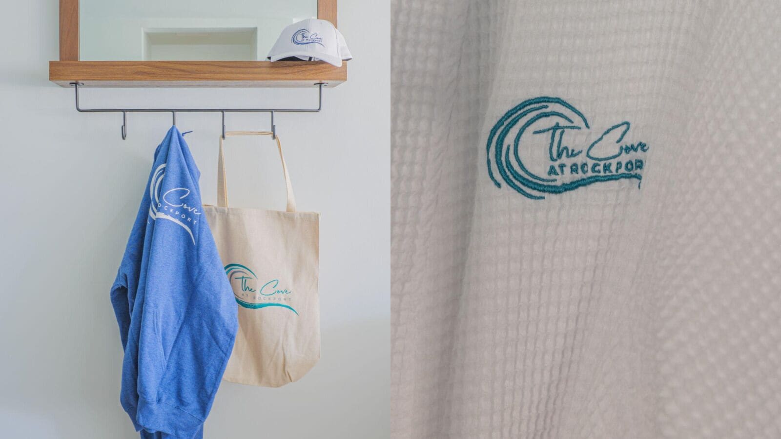 A towel rack with a blue towel and a beige tote bag hanging on it.