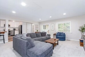 Smart TV, fireplace, table football, books