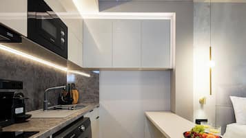 Fridge, microwave, coffee/tea maker, toaster