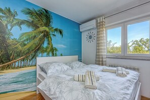 Family Apartment, Multiple Bedrooms (Sea Breeze Residence Mariella) | 2 bedrooms, iron/ironing board, free WiFi, bed sheets