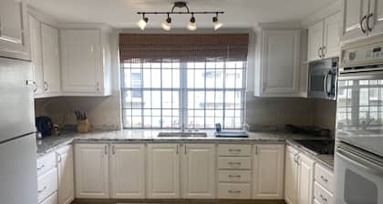 Roomy Lower 3 Bedroom West Coast Property with Pool