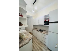 Fridge, microwave, dishwasher, coffee/tea maker