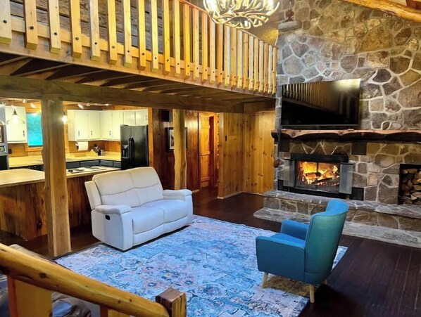 Smart TV, fireplace, books, offices