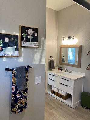 Hair dryer, towels, soap, shampoo