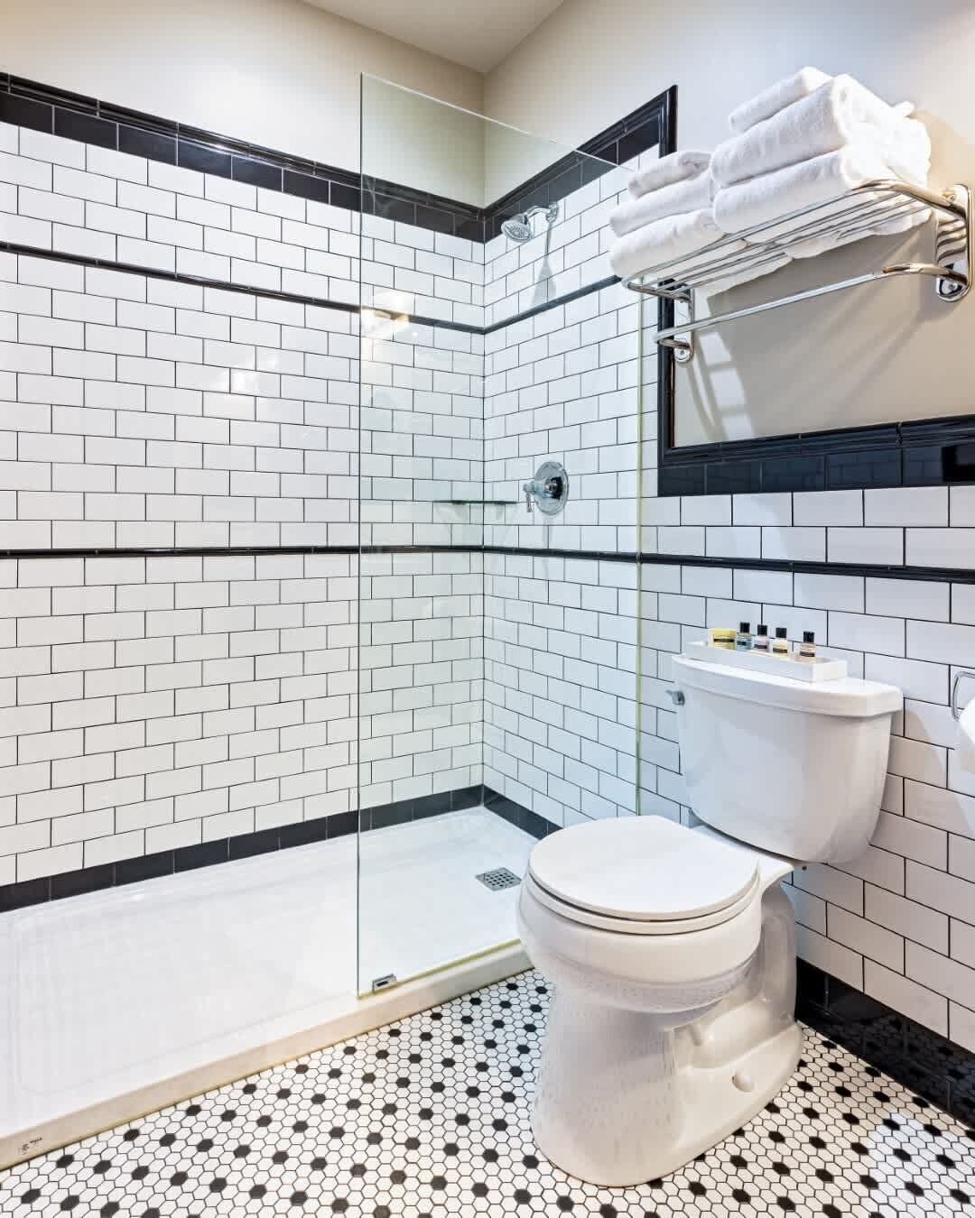 Shower, hair dryer, towels, shampoo