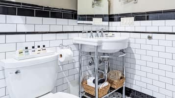 Shower, hair dryer, towels, shampoo