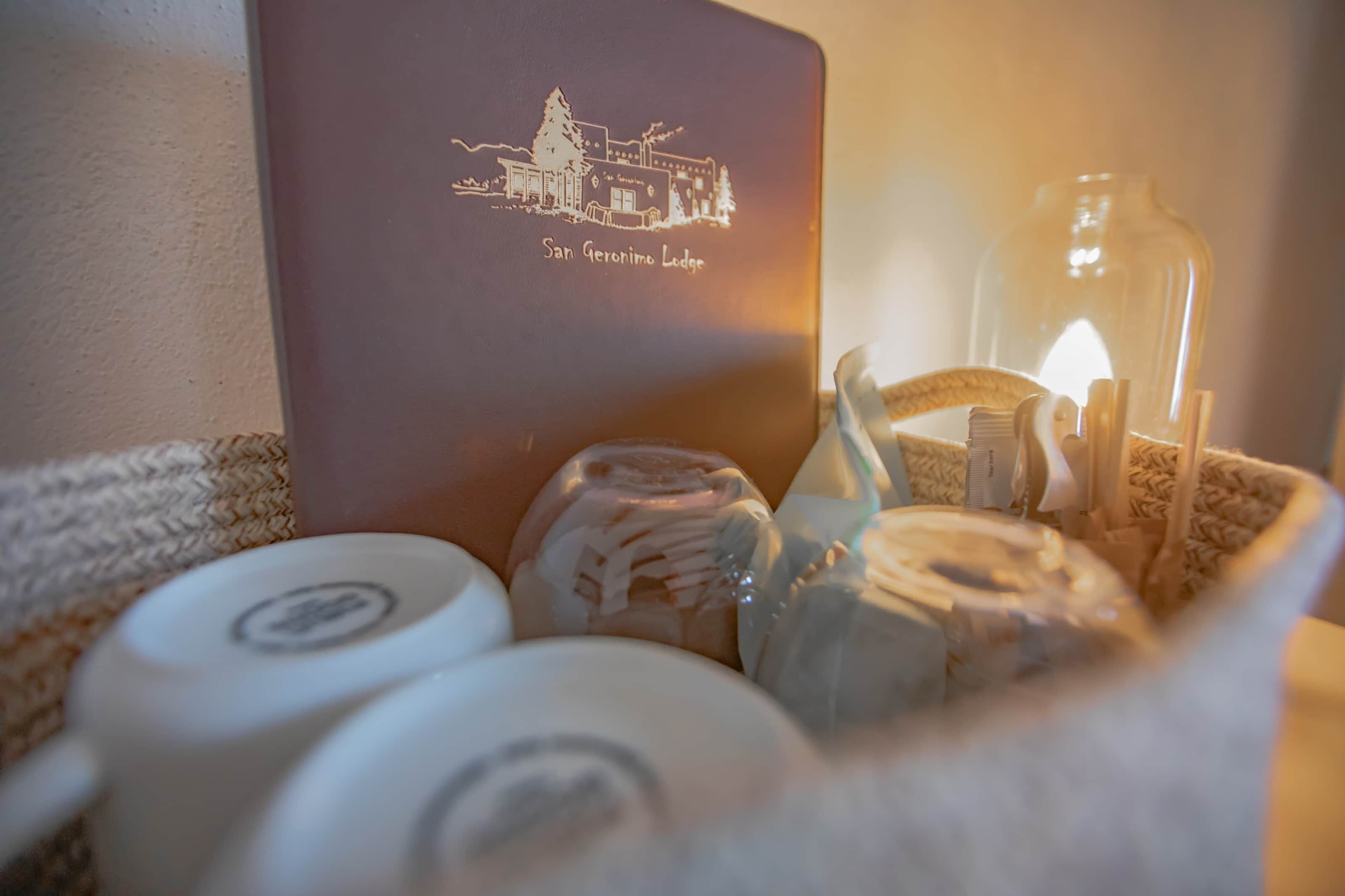 A close-up of a decorative item with a drawing of a building labeled "San Geronimo Lodge."