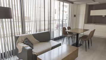Apartment, 2 Bedrooms | Living area | 32-inch flat-screen TV with cable channels, TV