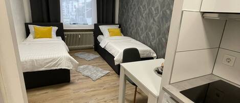 1 chambre, fer et planche à repasser, Wi-Fi gratuit, draps fournis