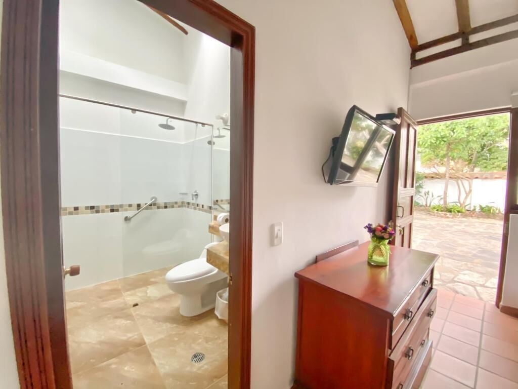 Shower, rainfall showerhead, towels