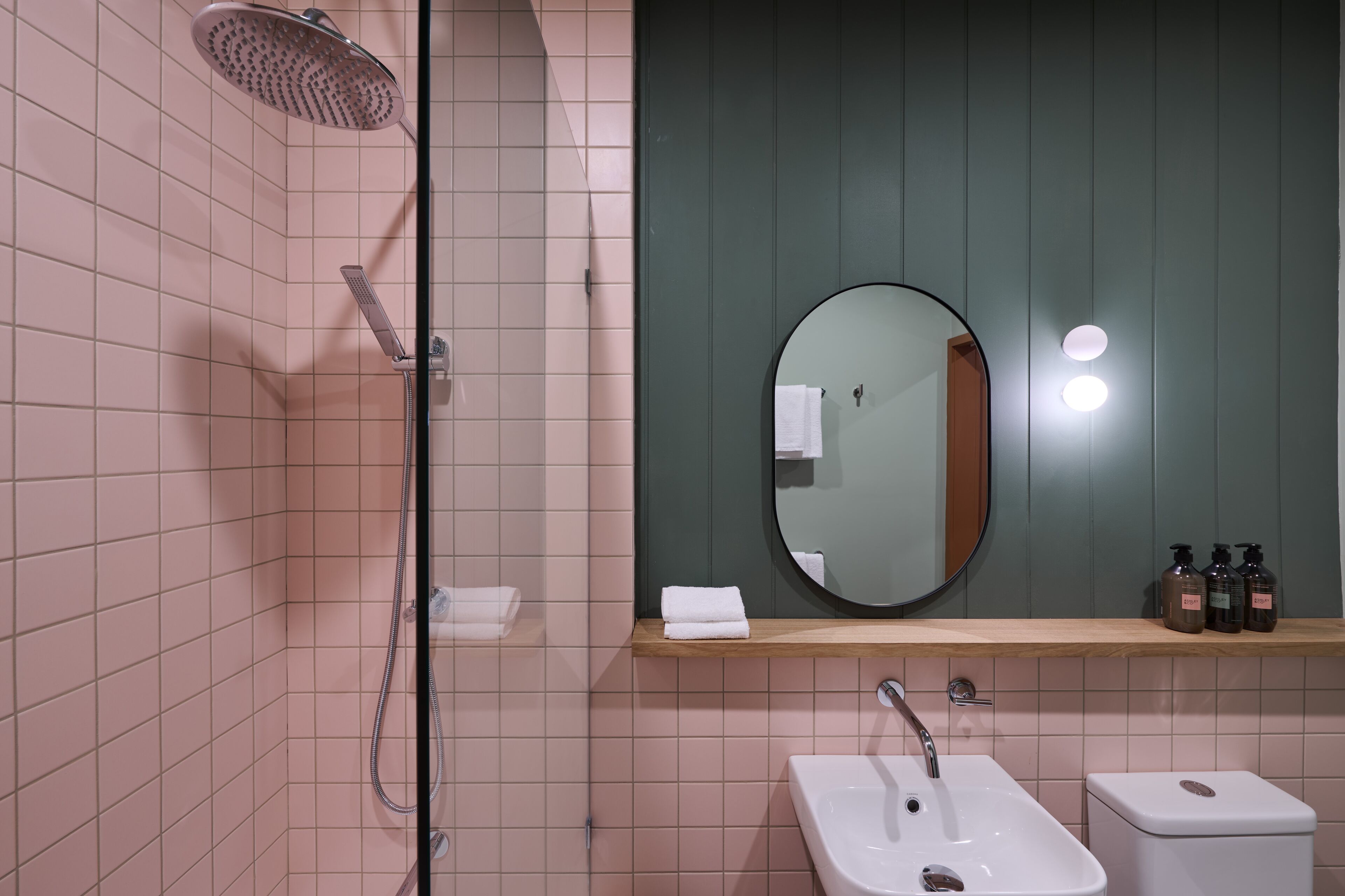 Deluxe Room | Bathroom | Designer toiletries, hair dryer, bathrobes, towels