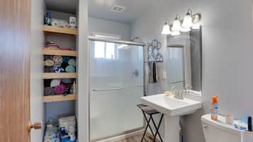 Hair dryer, towels, shampoo