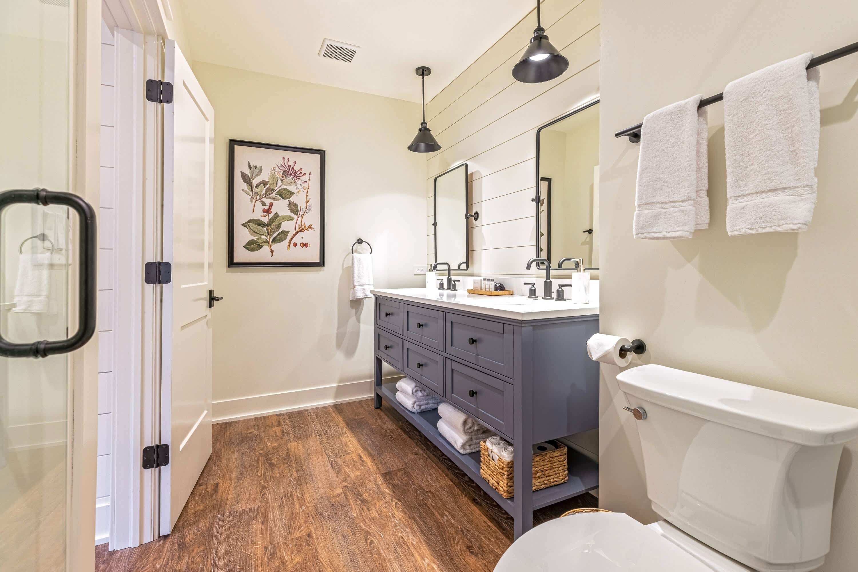 Shower, hair dryer, towels, shampoo