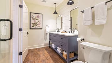 Shower, hair dryer, towels, shampoo