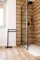 Deluxe Triple Room | Bathroom | Shower, rainfall showerhead, hair dryer, bathrobes