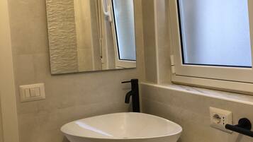 Classic Double Room | Bathroom | Shower, rainfall showerhead, hair dryer, bathrobes
