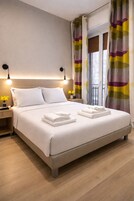 Deluxe Triple Room | Down comforters, memory foam beds, desk, soundproofing