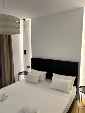 1 dormitorio, wifi gratis, ropa de cama. Apartment for 4 people with whirlpool and a large garden