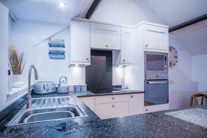 Fridge, microwave, electric kettle, toaster