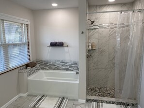 Shower, hair dryer, towels, soap