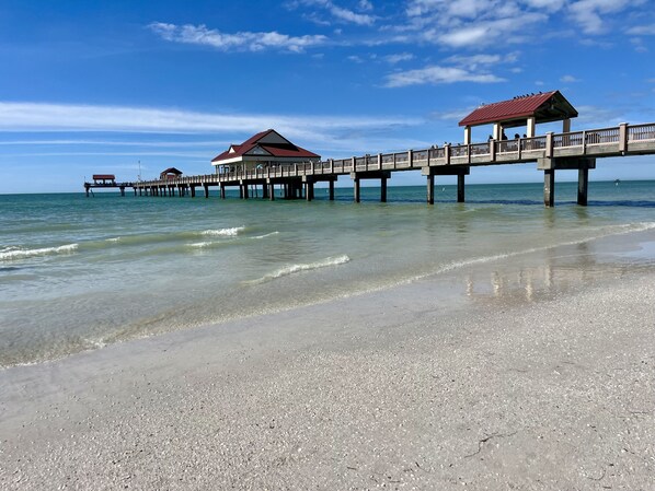 On the beach, sun-loungers