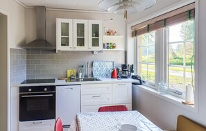 Fridge, stovetop, dishwasher, coffee/tea maker
