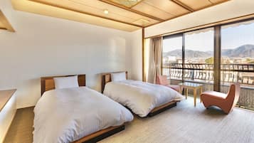 Basic Twin Room, Non Smoking | Down comforters, free WiFi, bed sheets