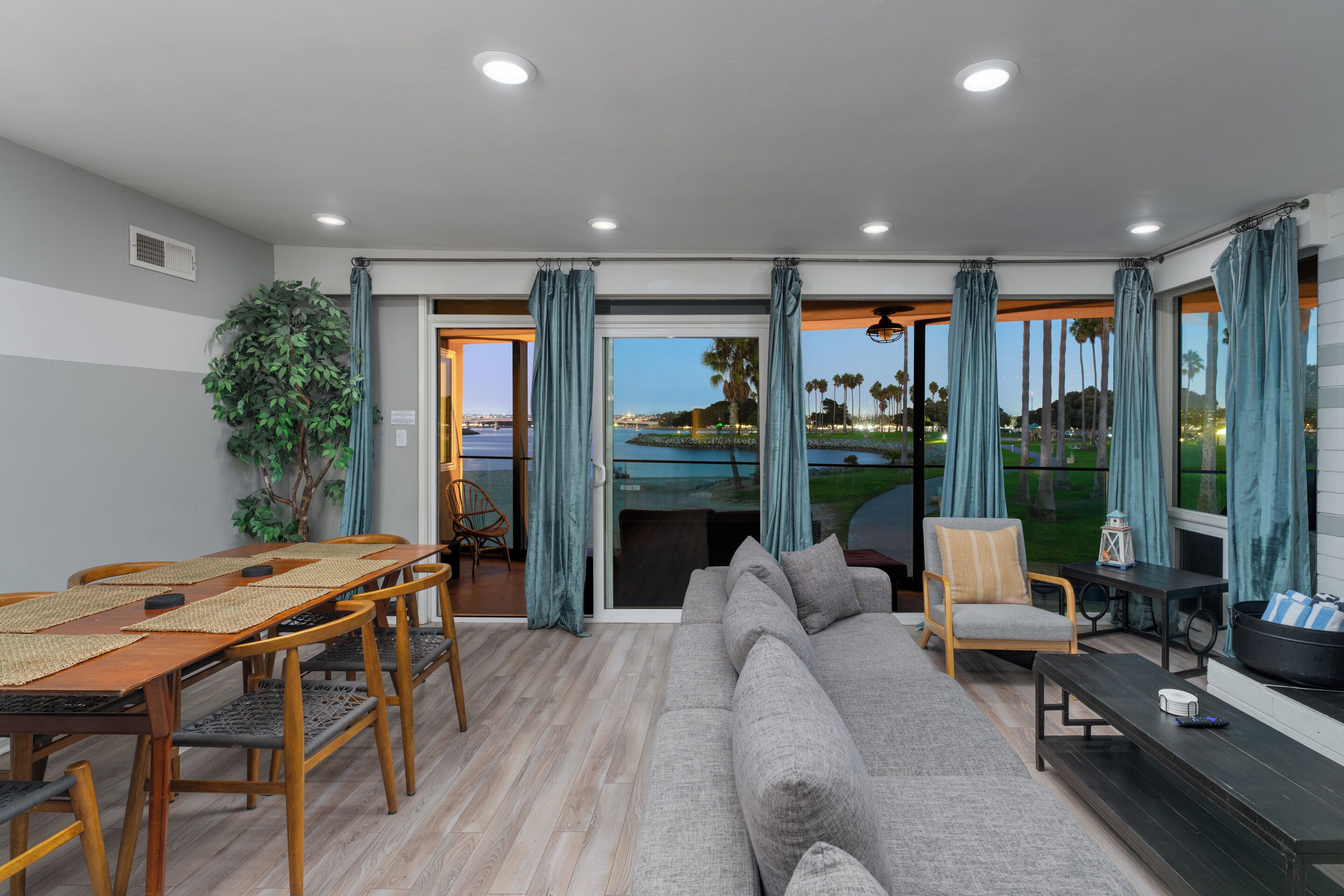 A spacious living space filled with natural light throughout the day.