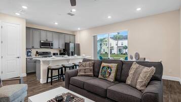 Townhome, Multiple Beds, Patio, Garden View (Caribbean Dreamin) | Living area | 42-inch flat-screen TV with digital channels