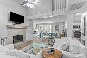 TV, fireplace, books