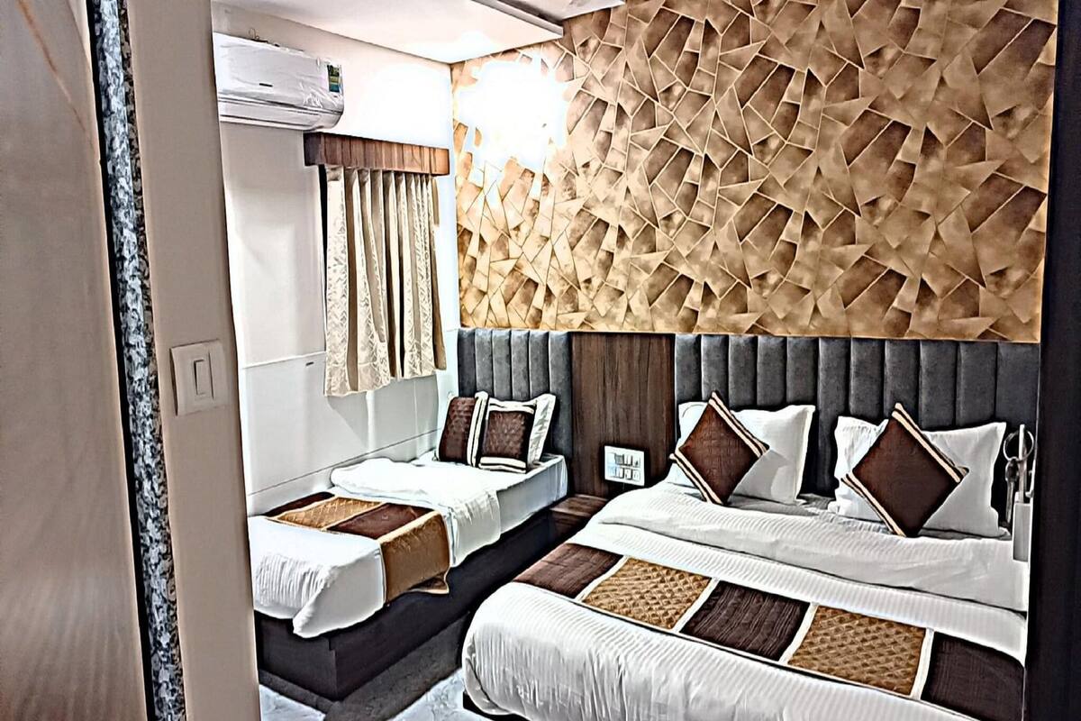 ห้องดีลักซ์ทริปเปิล | โต๊ะทำงาน, Wi-Fi ฟรี, ผ้าปูที่นอน