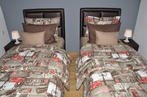 3 habitaciones, tabla de planchar con plancha, internet y ropa de cama 