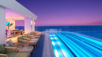Outdoor pool, pool umbrellas, pool loungers