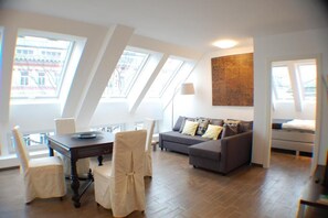 Apartment, 1 Bedroom | Living area | Flat-screen TV - Alga Apartments am Westbahnhof (Vienna)